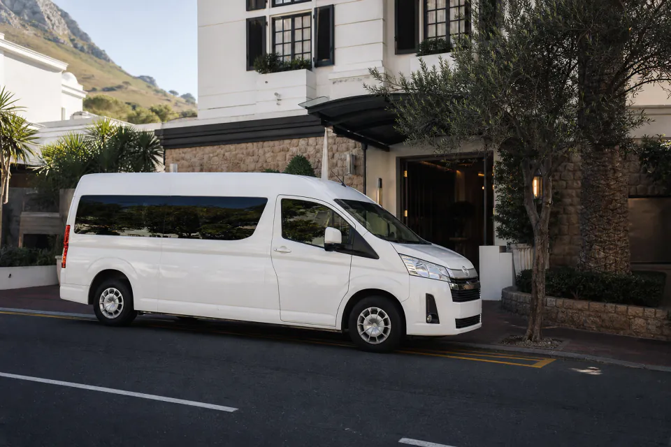 A private transfer vehicle waiting outside a Cape Town hotel